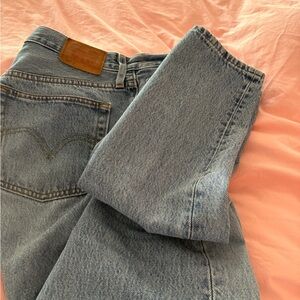 Levi's 501 Light Blue Denim Jeans with button fly.
26